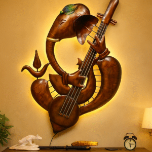 Handcrafted Ganesh Ji metal wall art with LED backlight – antique brown finish, musical instrument design for home and temple décor
