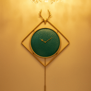 Luxury emerald green wall clock with golden antler frame, diamond design, and pendulum chain – Everaura Ever aura