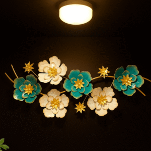 Handcrafted metal floral wall art featuring beautiful teal and off-white blossoms with golden centers on a metallic vine – elegant decorative wall hanging for living room and bedroom