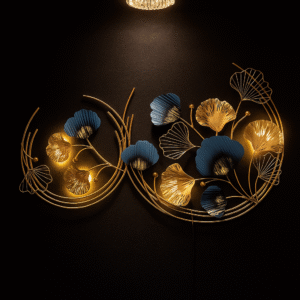 Handcrafted metal wall art featuring golden and blue Ginkgo leaves on a curved vine with integrated warm LED lighting – modern decorative wall hanging for living room, bedroom, or entryway.