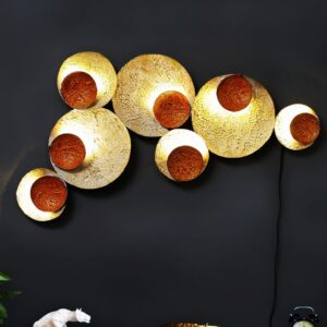 Golden circular metal wall art with backlighting – luxury round wall décor for living room and modern interiors.”